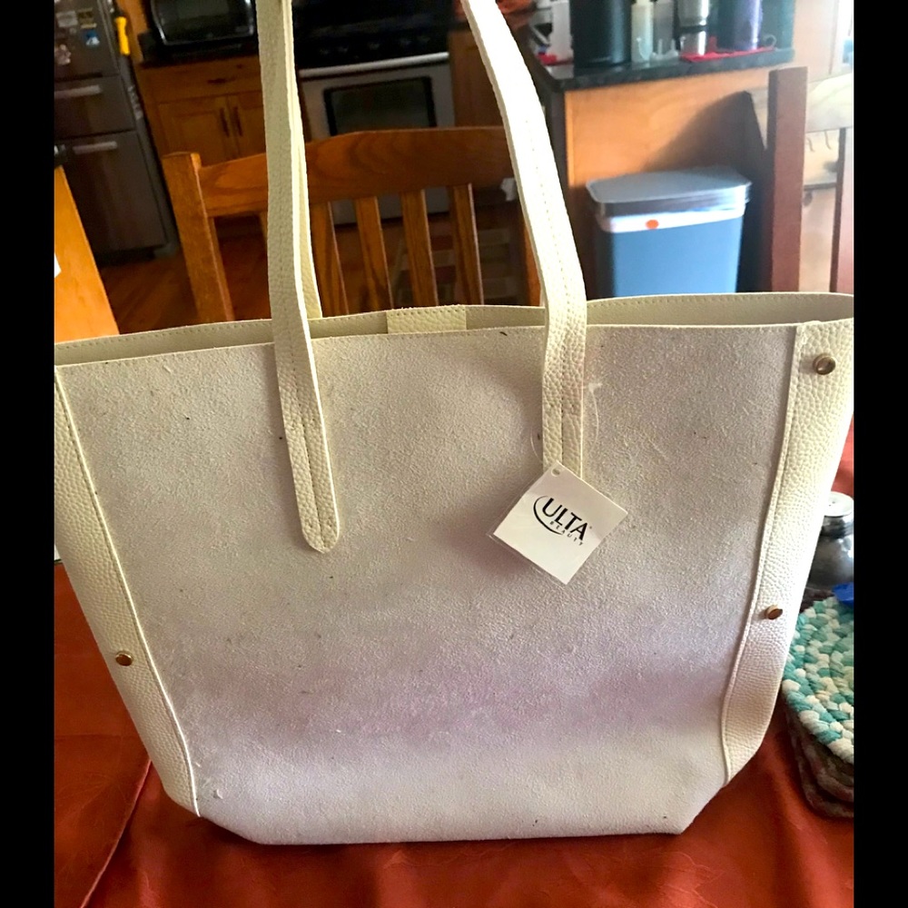 NWT Ulta Beauty Cream Colored White leather Tote bag. 2 handles.magnetic closure